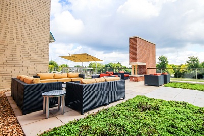 The Reserve at High Point - Private Outdoor Terrace with Fireplace and Grilling Station